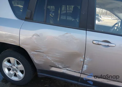 2015 Jeep Compass Sport z USA, uszkodzony, nr VIN 1C4NJCBA8FD156623